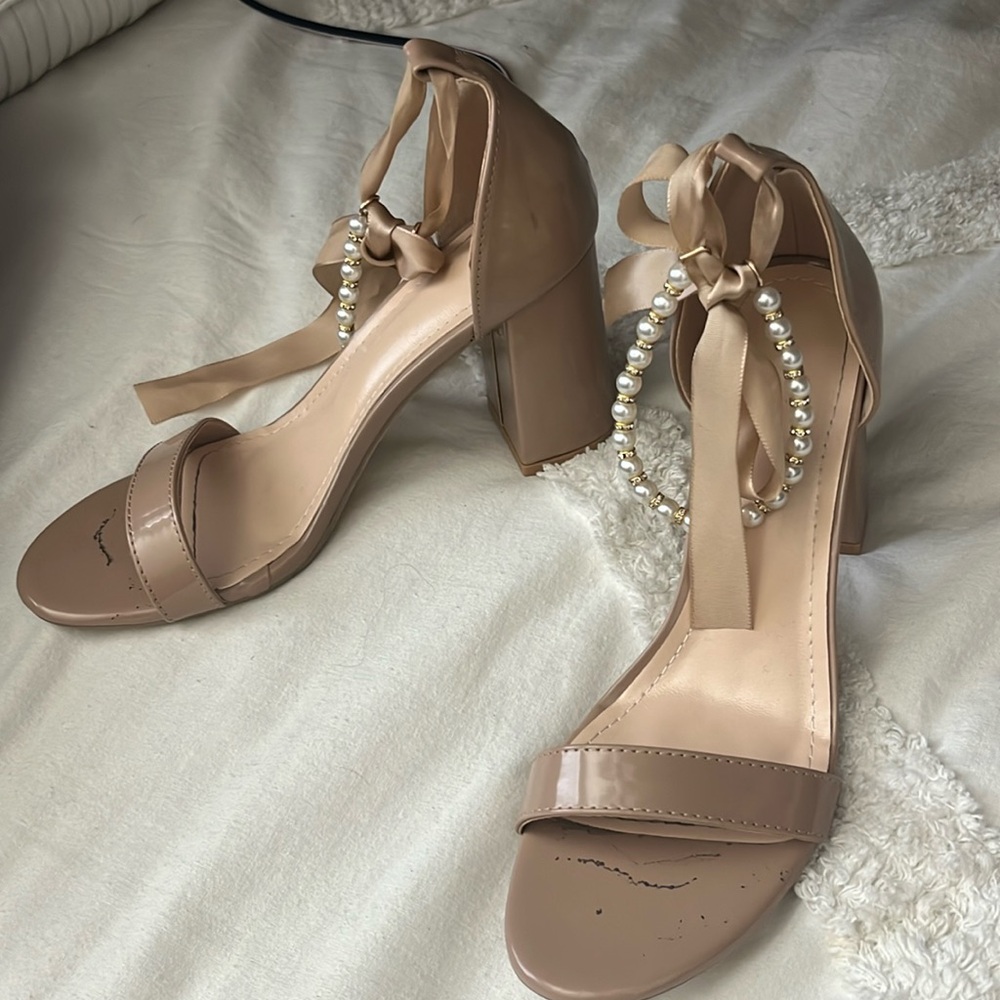 Super adorable nude heels with bow and pearls around ankel